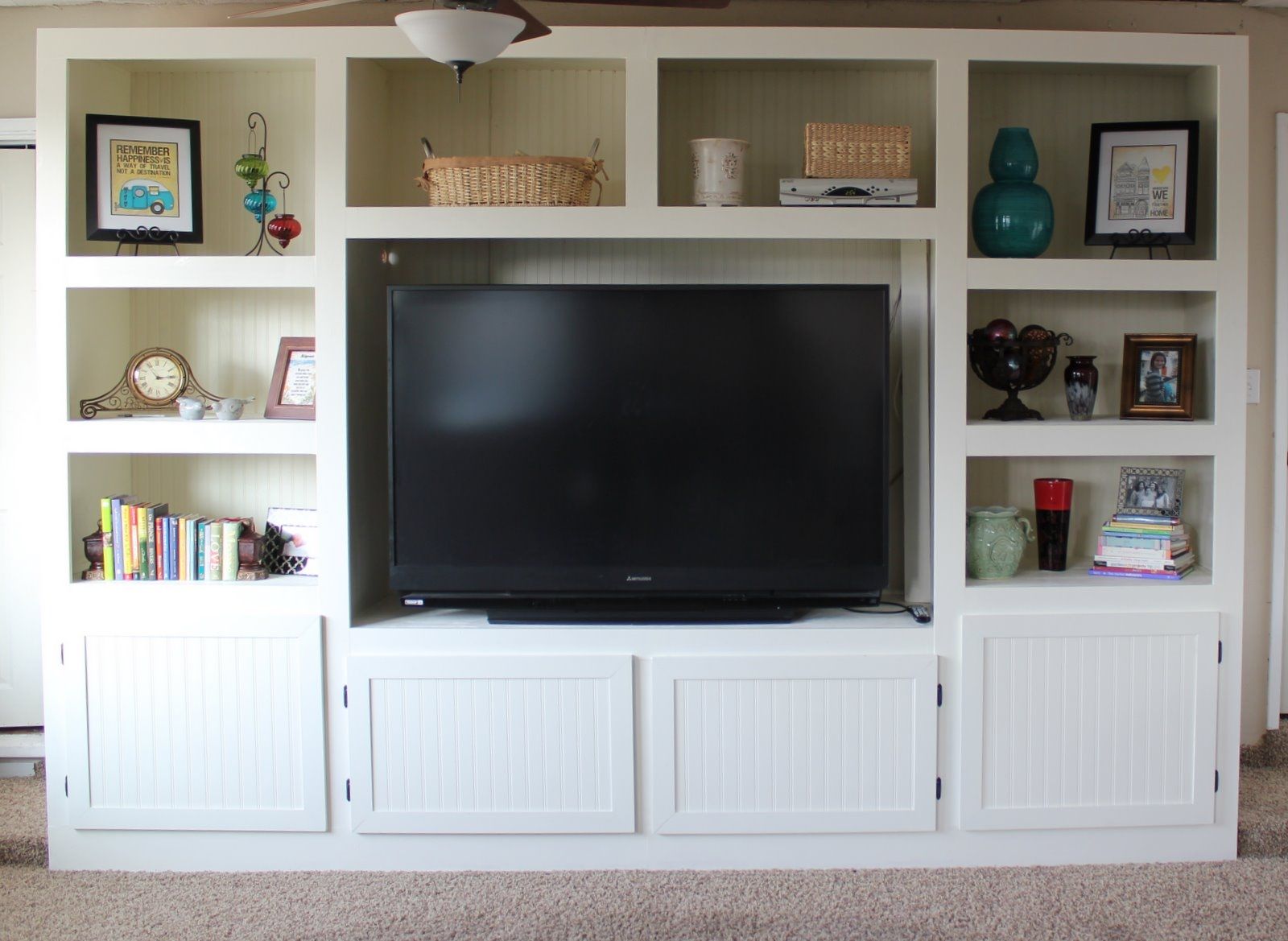 Living Room Renovation With Diy Entertainment Center For Flat Throughout Tv And Bookcase Units (View 6 of 15)