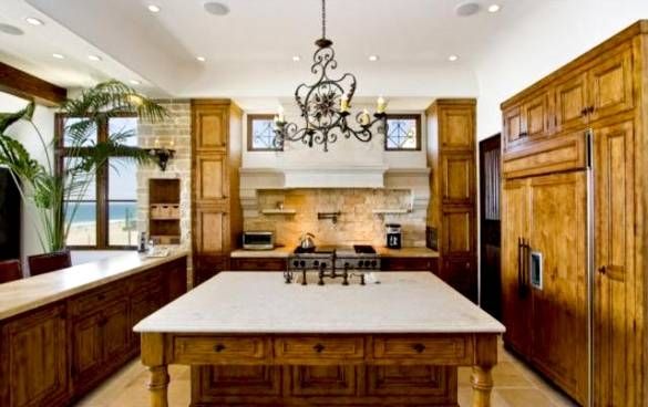 Celebrity Decorator's Secret: Wrought Iron Chandeliers In The In Wrought Iron Kitchen Lights Fixtures (Photo 6 of 15)