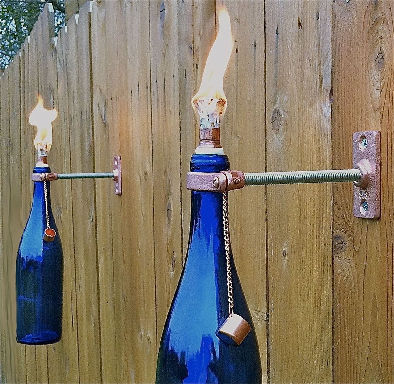 Cobalt Blue Wine Bottle Tiki Torches Will Add Stylish Lighting To For Outdoor Hanging Bottle Lights (View 15 of 15)