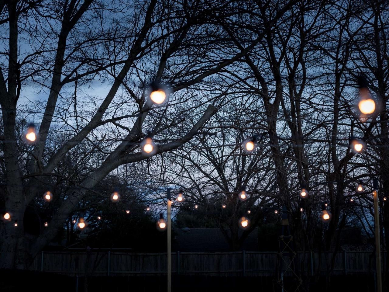 How To Hang Outdoor String Lights From Diy Posts | Hgtv Inside Hanging Lights In Outdoor Trees (Photo 4 of 15)