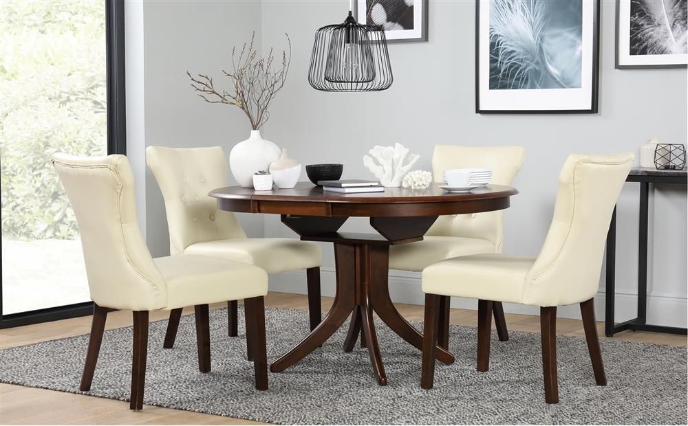 Warner Round Pedestal Dining Tables Regarding 2020 Hudson Round Dark Wood Extending Dining Table – With 4 Bewley Ivory Chairs (View 12 of 20)