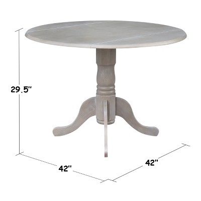 Fashionable Round Dual Drop Leaf Pedestal Dining Table White Pertaining To Boothby Drop Leaf Rubberwood Solid Wood Pedestal Dining Tables (Photo 10 of 20)