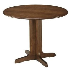 Brown Dining Tables Throughout Favorite Bowery Hill Round Wood Dining Table In Brown 680270418097 (Photo 14 of 20)