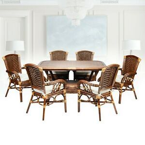 Most Up To Date Dark Hazelnut Dining Tables In Natural Rattan Set Of 6 Alexa Dining Armchairs And Oval (View 19 of 20)