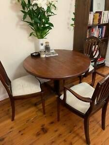 Well Liked Vintage Chiswell Extendable Round Dining Table With For Vintage Brown Round Dining Tables (View 10 of 20)