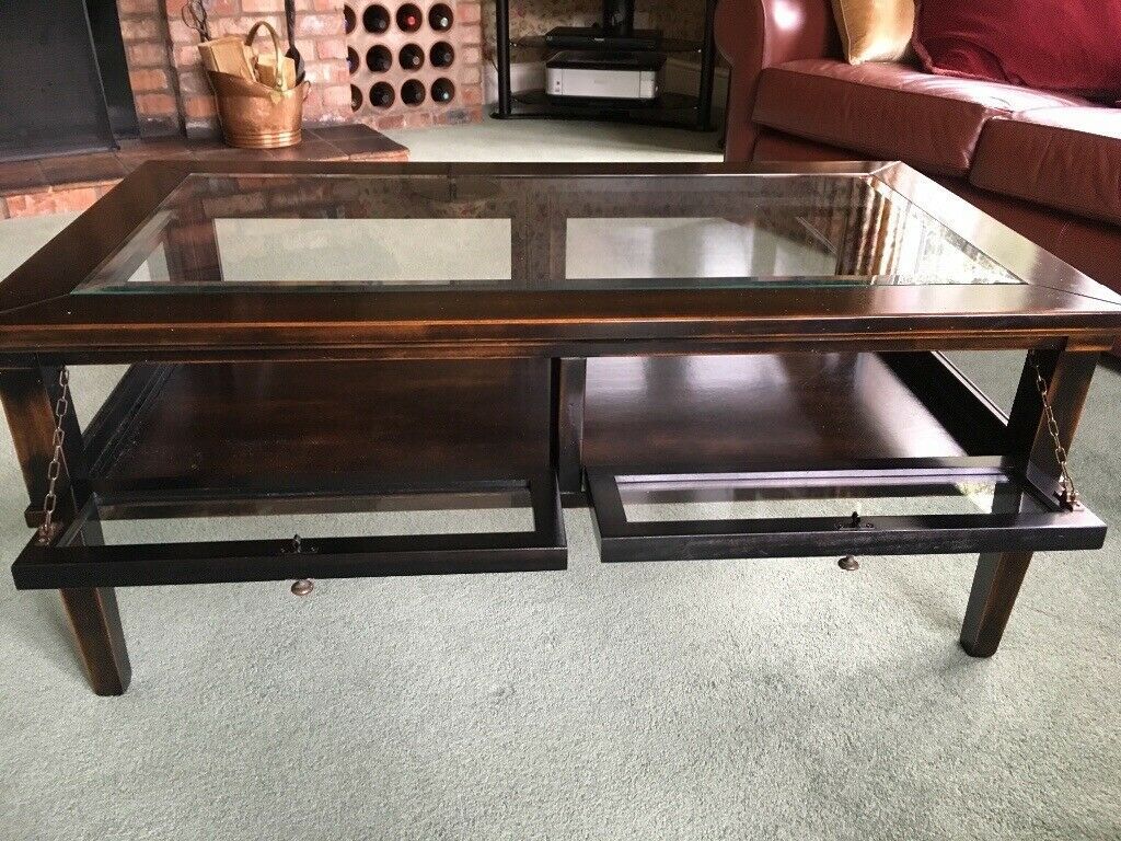 Dark Wood Coffee Table With Glass Top And Drop Down Doors Pertaining To Espresso Wood And Glass Top Console Tables (View 13 of 20)
