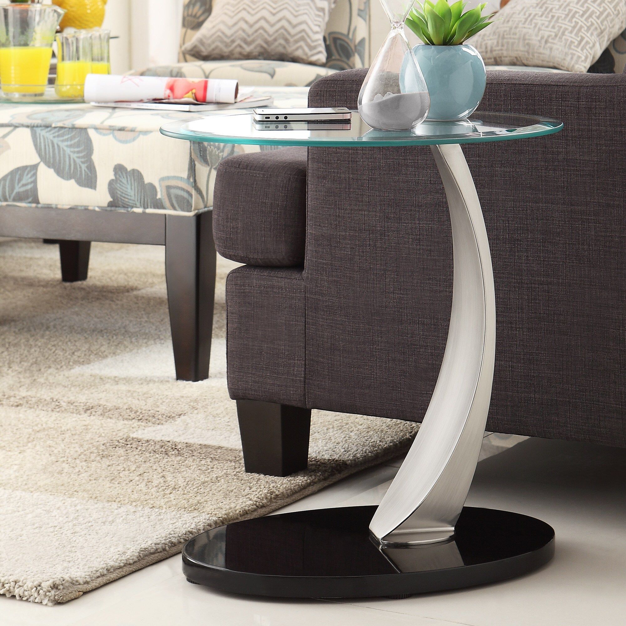 Tribecca Home Ryde Oval Tempered Glass Steel Modern End Inside Glass And Pewter Oval Console Tables (View 15 of 20)