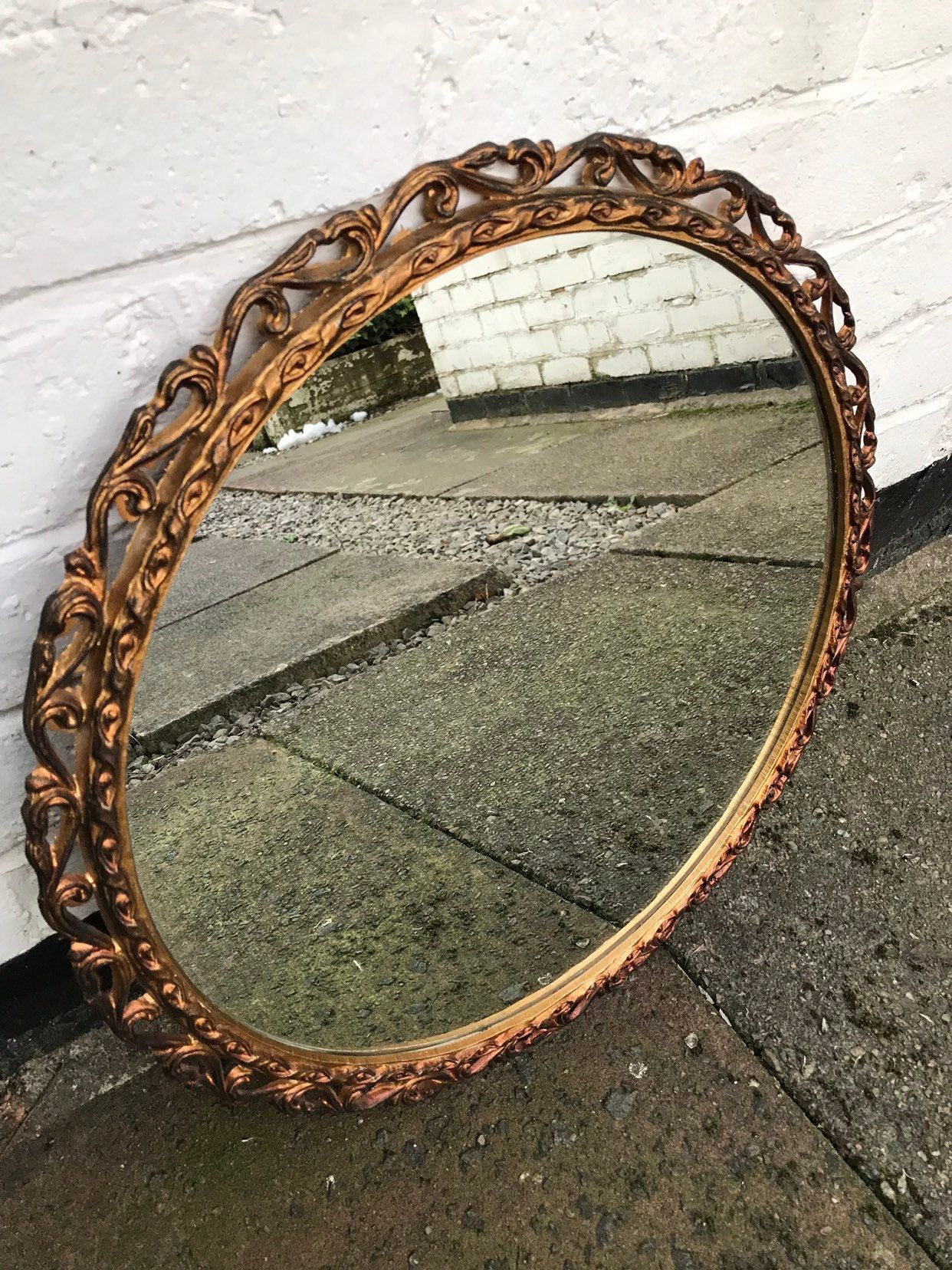 Gold Ornate Metal Mirror With Round Glass, Very Unusual Round Mirror Intended For Round Metal Luxe Gold Wall Mirrors (View 15 of 15)