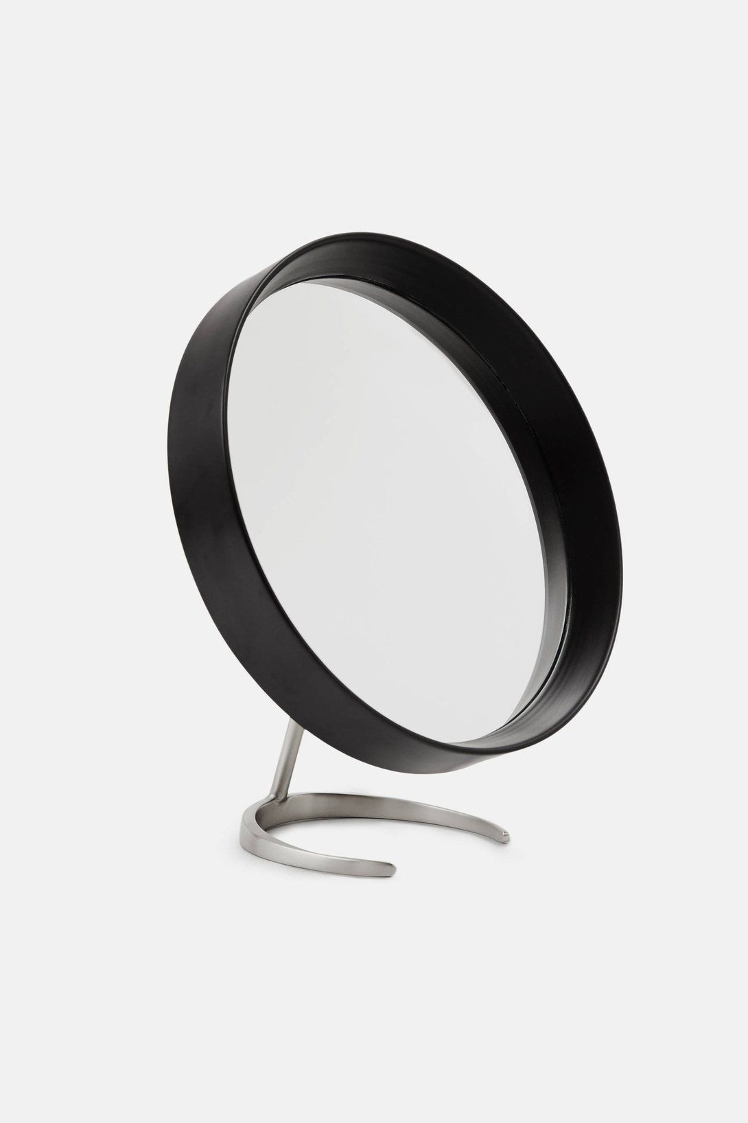 Matte Black Round Mirror With Matte Nickel Stand | Black Round Mirror Regarding Matte Black Metal Wall Mirrors (Photo 1 of 15)