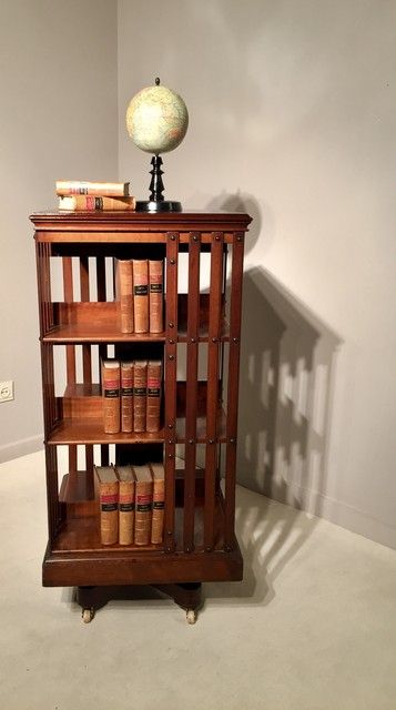 A 19th Century Three Tier English Mahogany Revolving Bookcase Having A  Cast Iron Base. Signed Maple & Co (View 12 of 15)