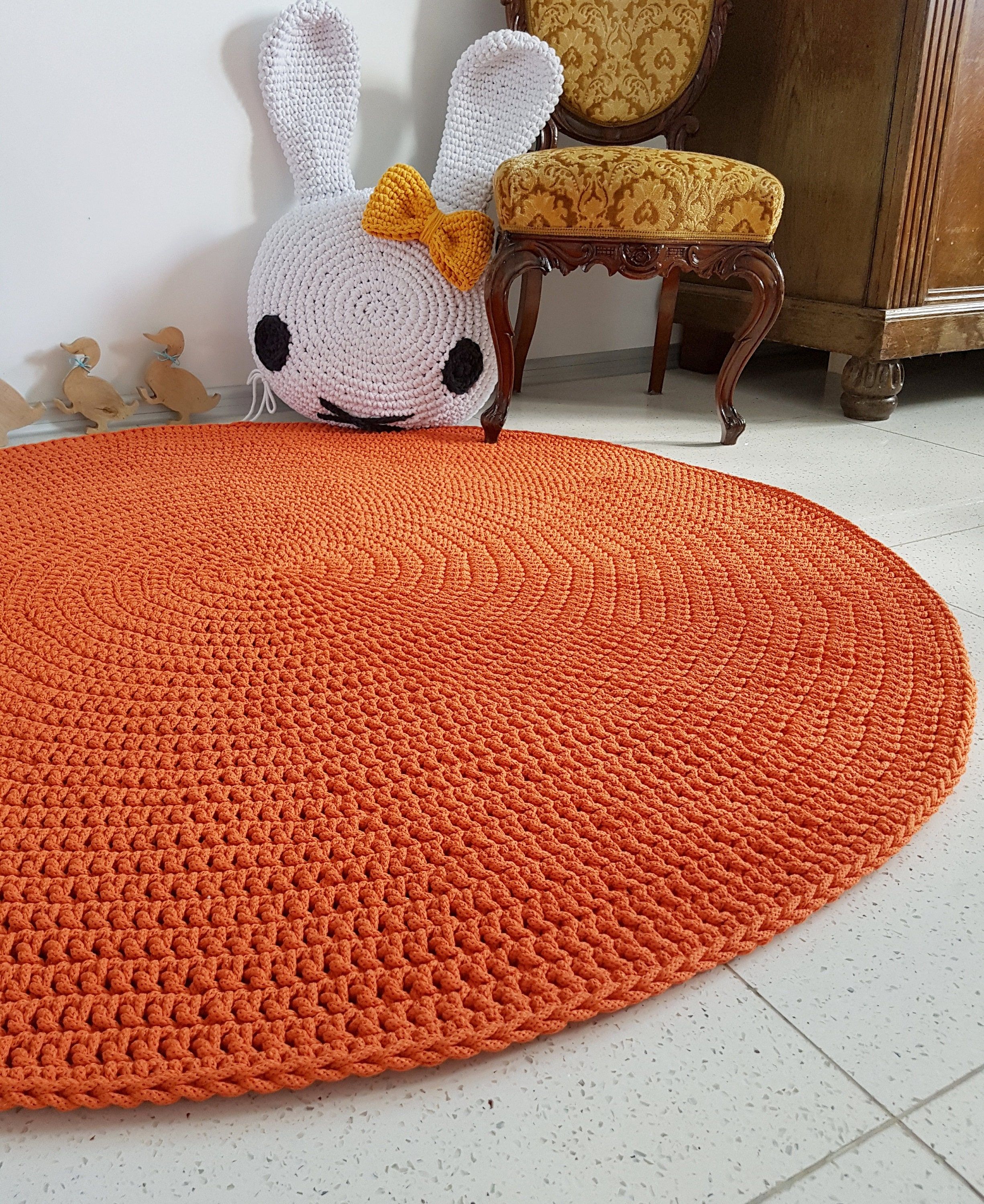 Featured Photo of 15 Best Collection of Orange Round Rugs