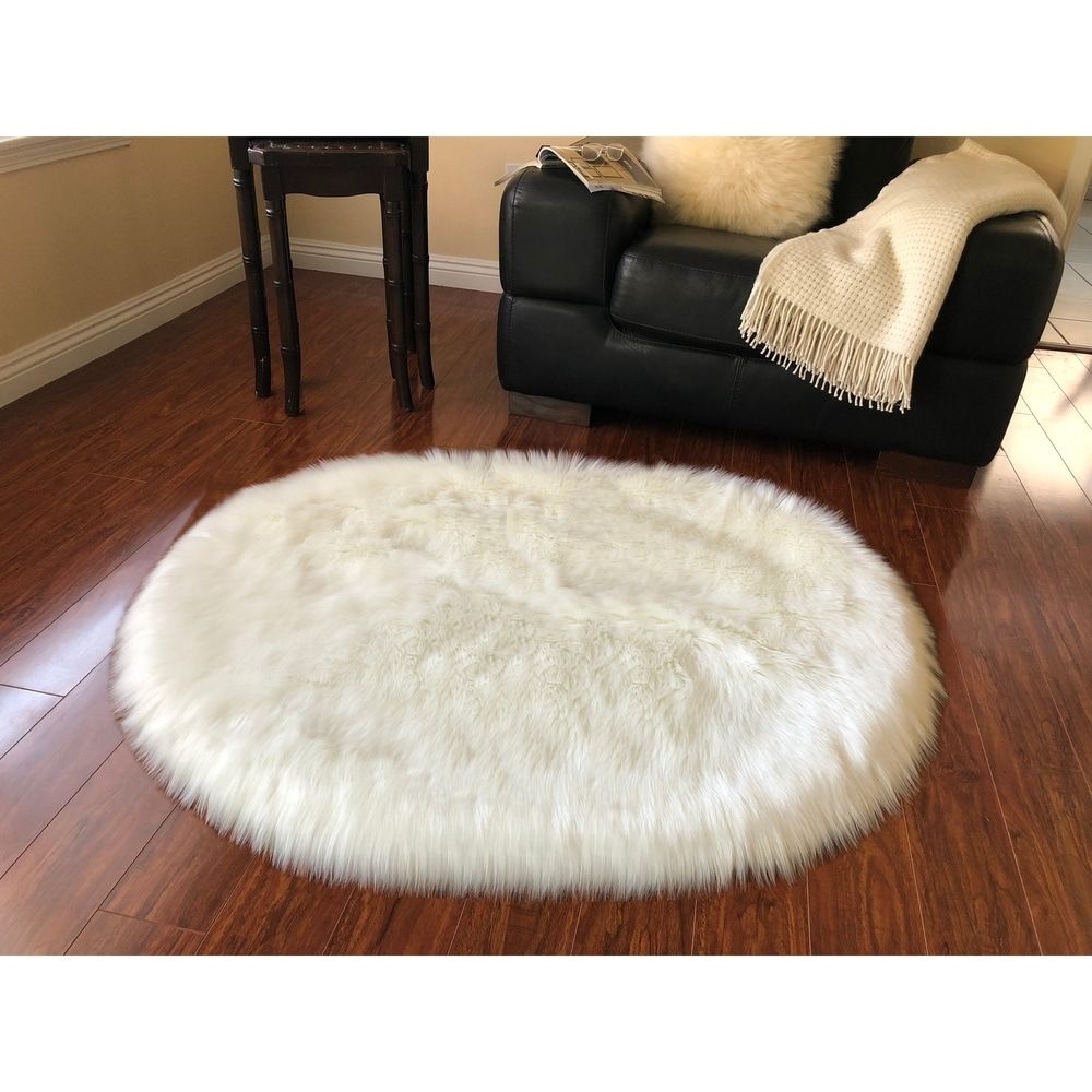 Spectrum Faux Sheepskin Oval Shape Shag Area Rug – On Sale – Overstock –  24202594 With Shag Oval Rugs (View 3 of 15)
