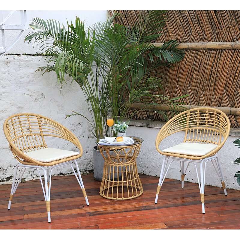 18 Wicker Patio Furniture Pieces For Every Budget And Style In Balcony Furniture Set With Beige Cushions (View 11 of 15)