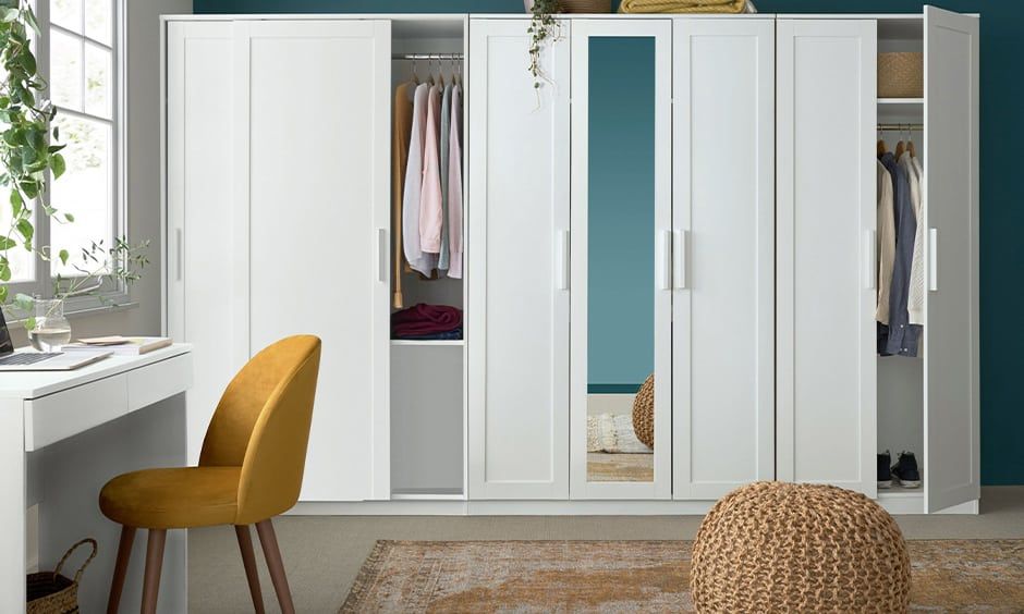 7 White Bedroom Cupboard Designs | Design Cafe Throughout Cheap White Wardrobes (Photo 11 of 15)