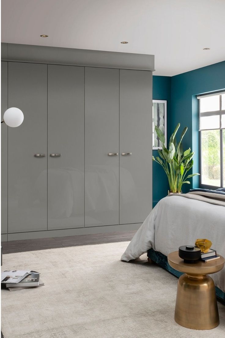 Grey Fitted Wardrobes Go Perfectly With Bedroom Wall Painted In Classic  Blue (View 7 of 15)