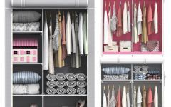 15 Collection of Double Rail Canvas Wardrobes